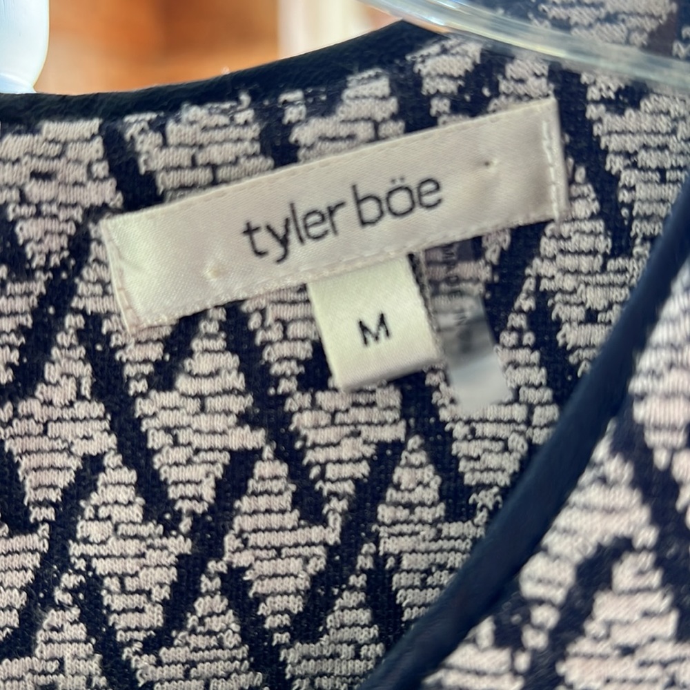 Tyler Boe long sleeve swing dress with front pleat and slash pockets